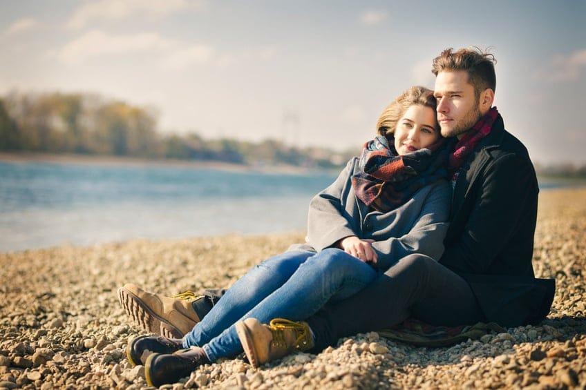 couple beach cold romance