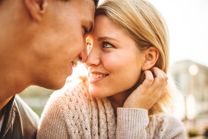 couple flirting at sunlight