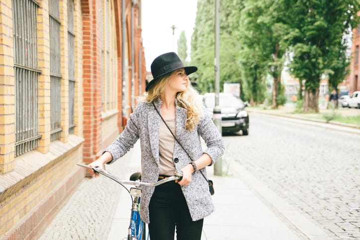 young woman bike hipster city