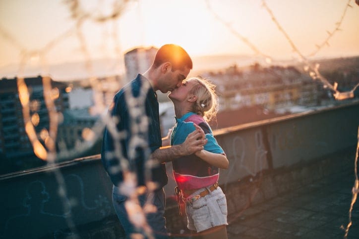 Loving couple enjoy their private party on the rooftop of the building