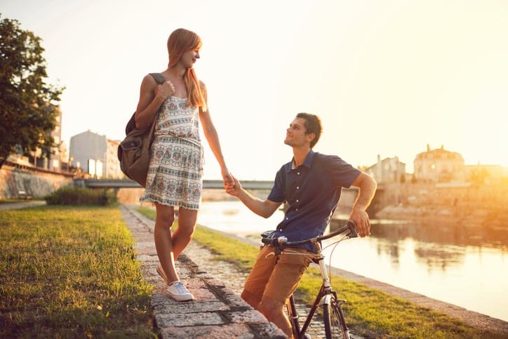 Beautiful love couple enjoying a romantic stroll
