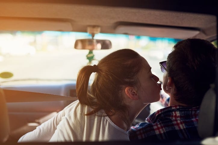 couple kiss car happy love