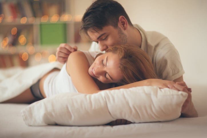 Happy couple in a bedroom