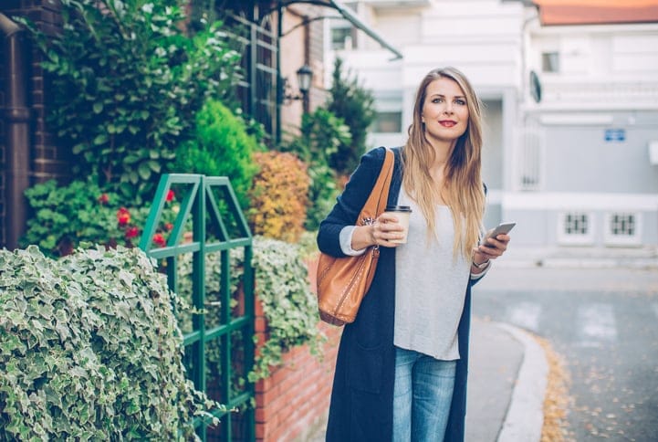 Stylish woman stood on the street