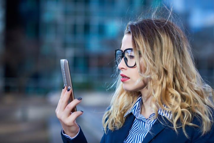 confused woman getting a text