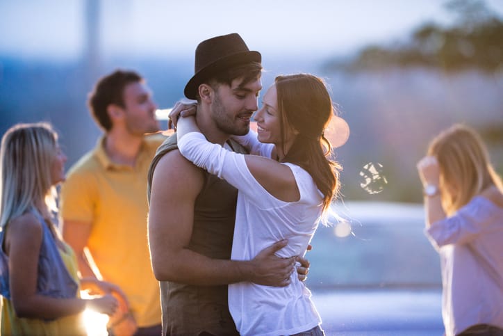 Couple in love dancing together on an evening party.