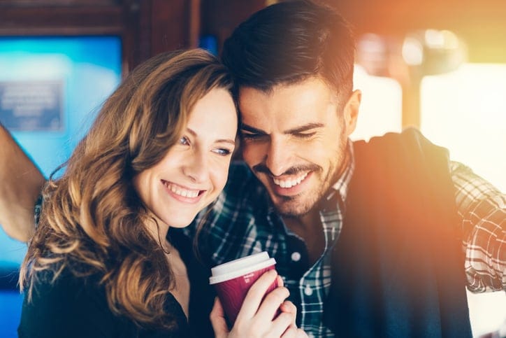 Happy couple in a tram