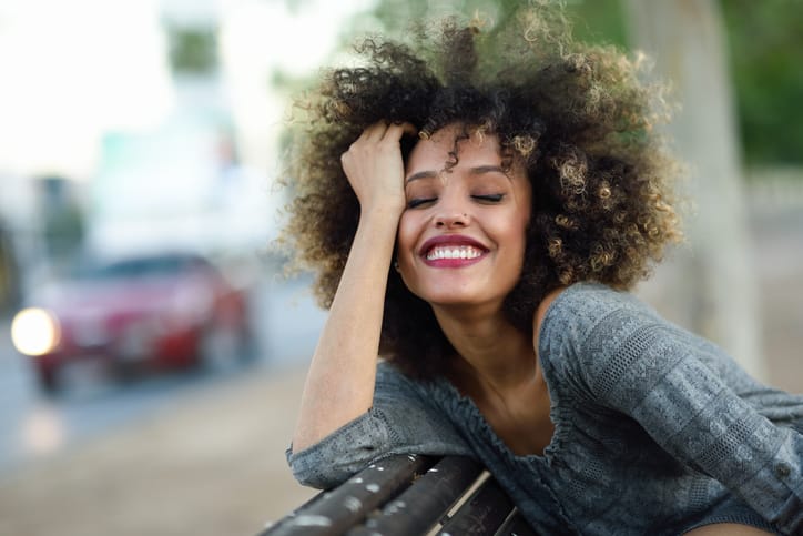 young happy woman outdoors park