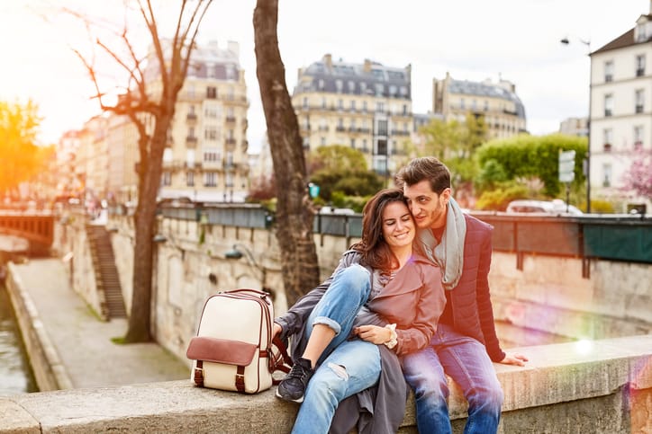happy couple embracing in park