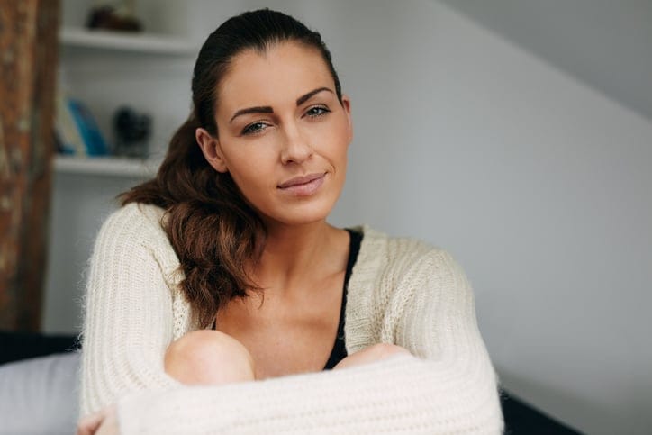 Young woman at home alone.