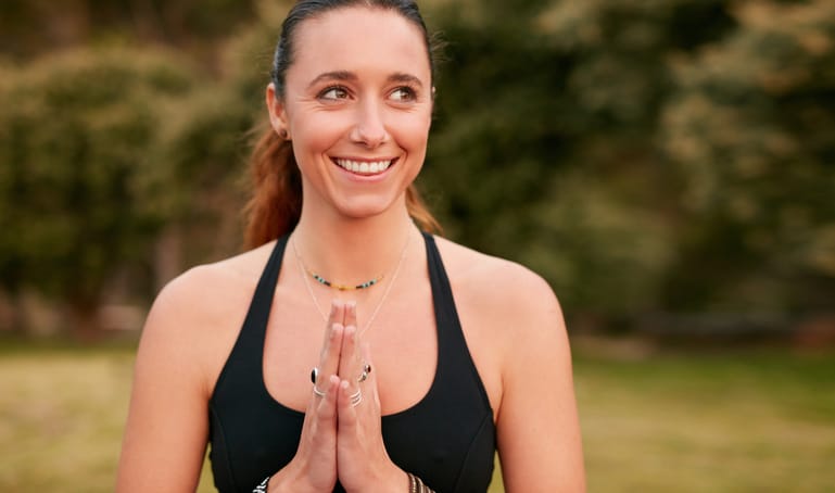 Confident young woman doing yoga