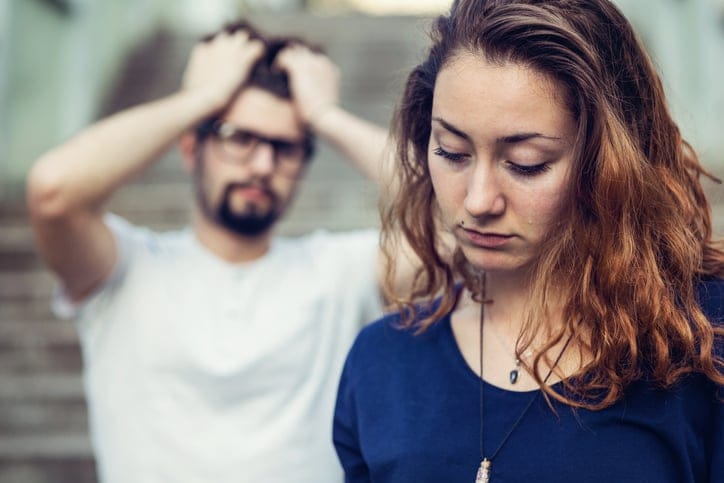 boyfriend and girlfriend exhausted from their relationship