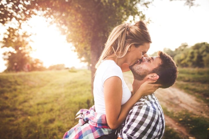 Photo of young couple enjoying in love
