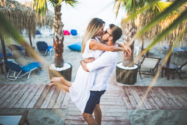 Photo of loving couple on the beach