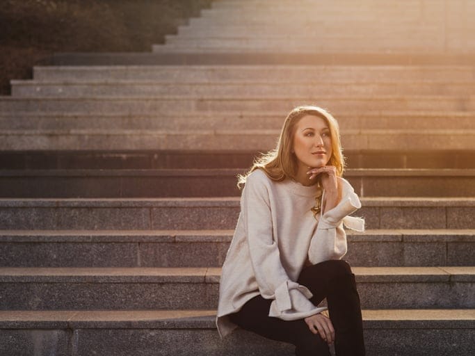 Beautiful young modern woman in the city
