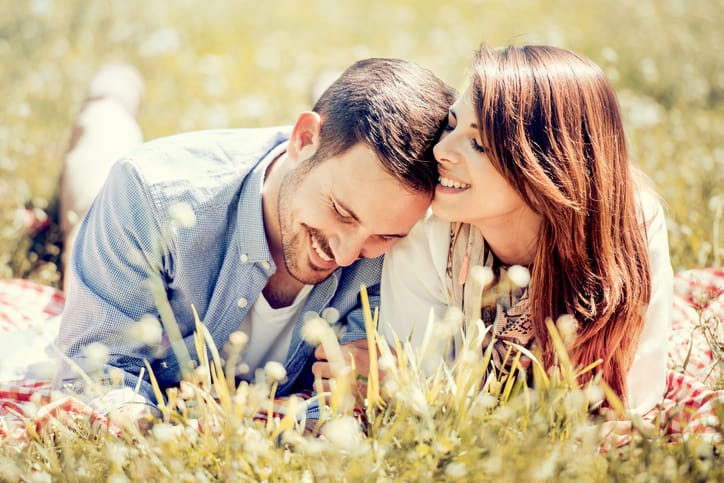 Happy young couple enjoying a summer day.