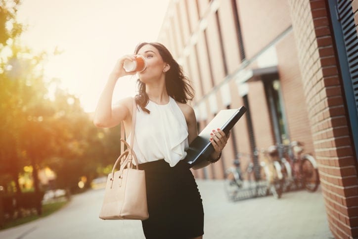 Businesswoman in a rush to work.