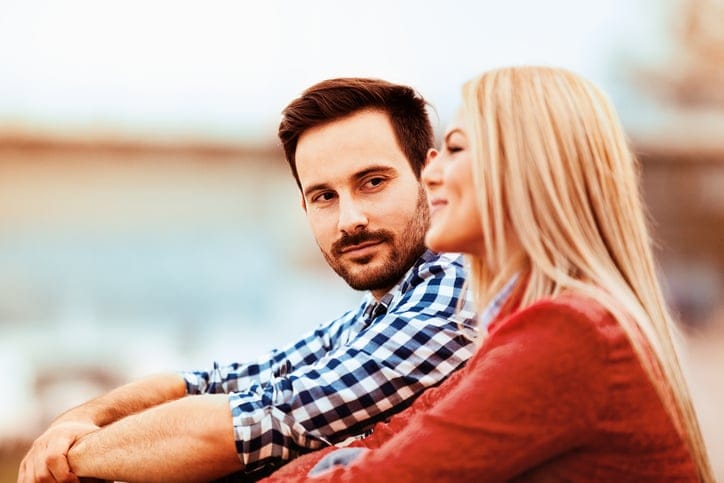 Young happy couple is enjoying outside.