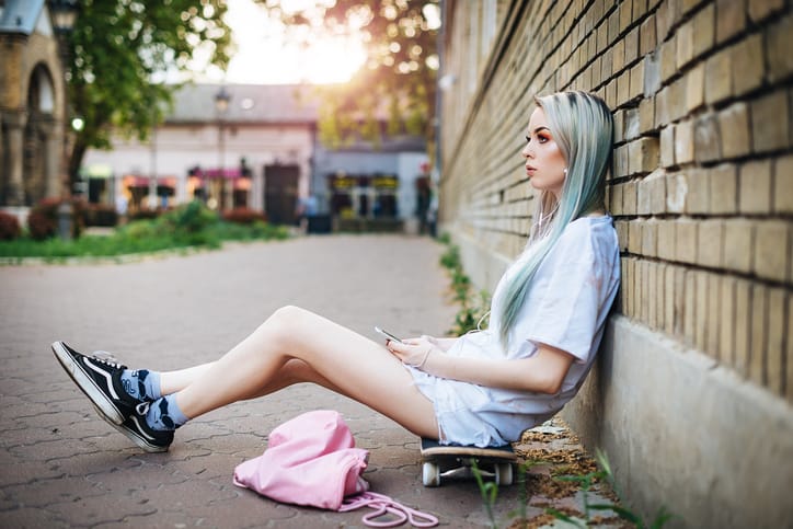 Urban girl with skateboard