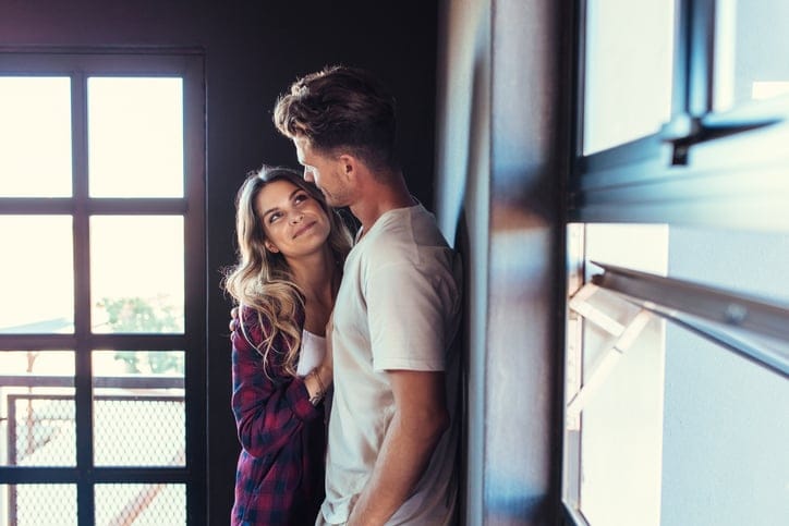 Romantic young couple looking at each other
