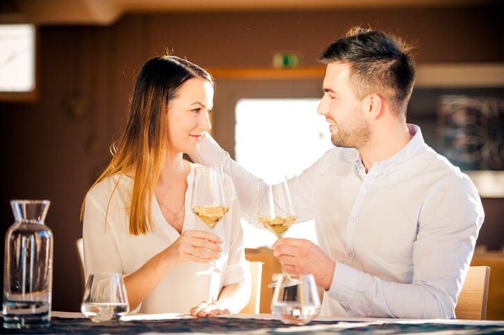 Young Loving Couple Portrait on a Date in a Restaurant