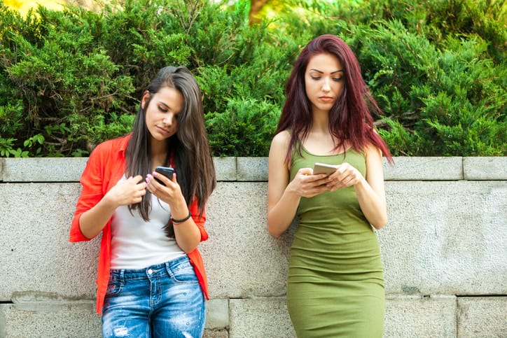 Two girls with phone