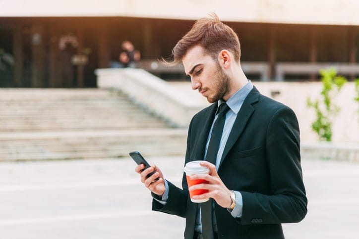 Man texting on phone