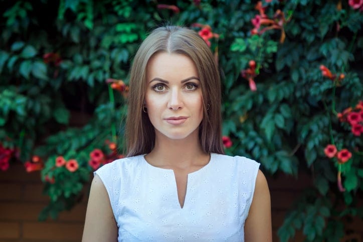 Portrait of beautiful young serious woman