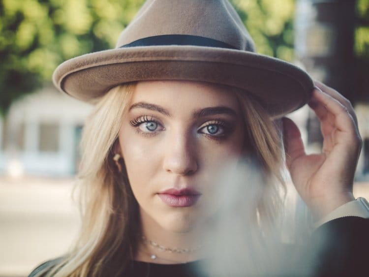 woman blue eyes hat