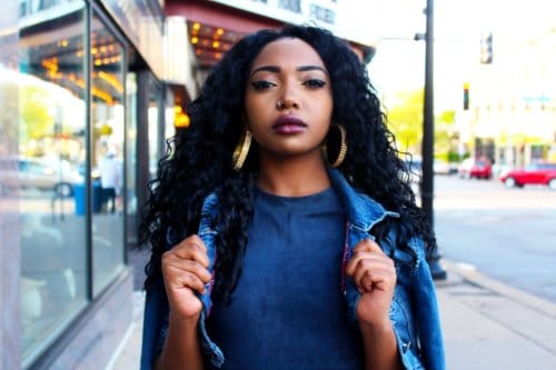 Black girl blue jacket