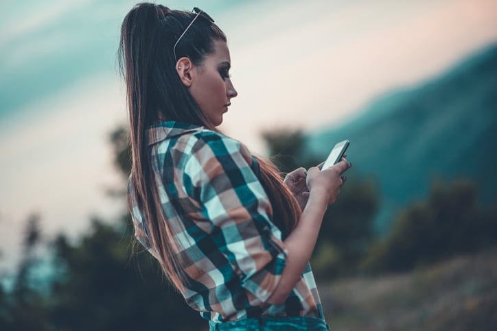 female writing a text
