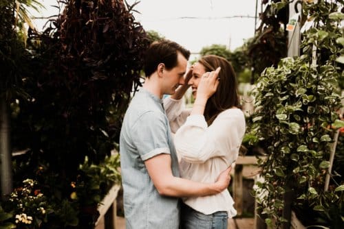 Couple kissing in garden