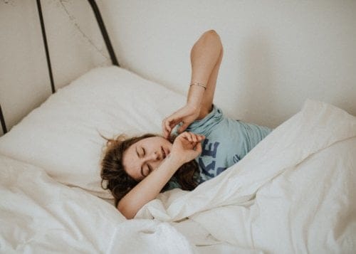 woman alone in bed