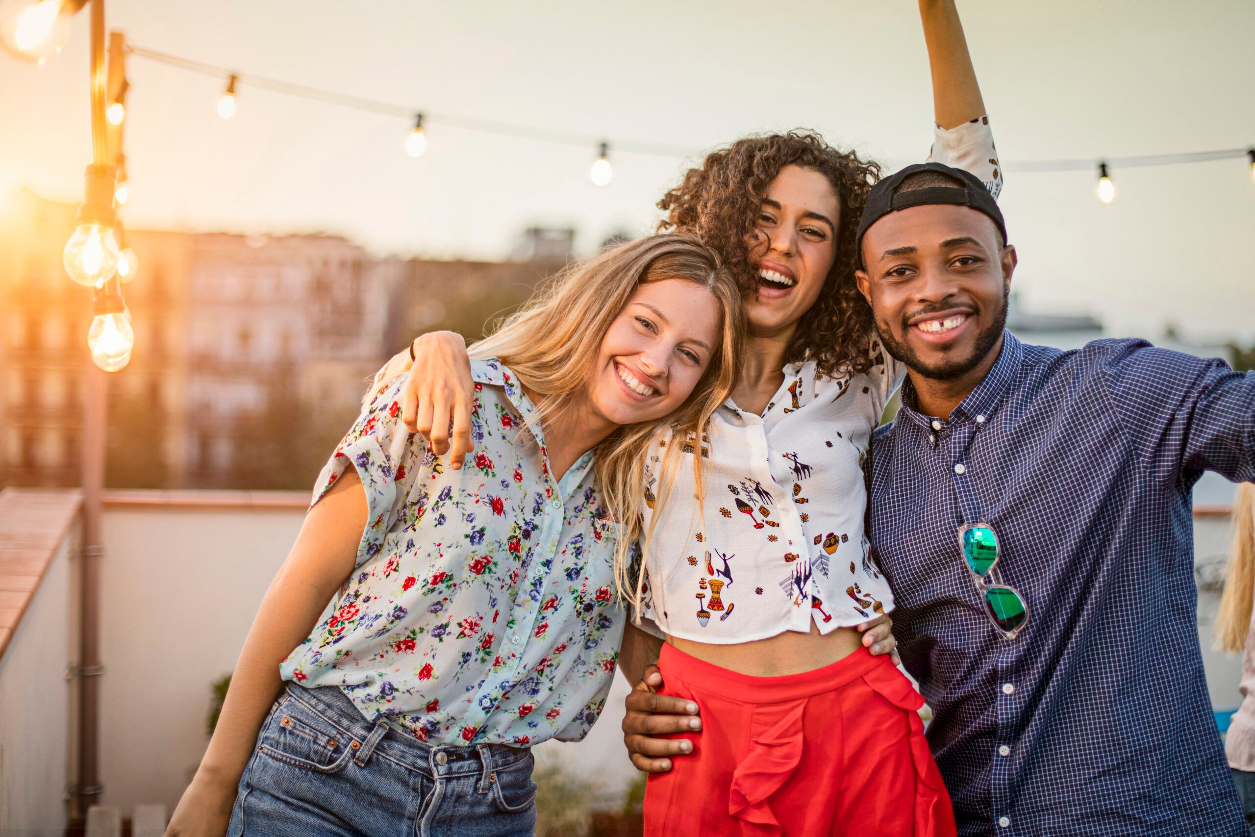 Portrait of friends enjoying in terrace party