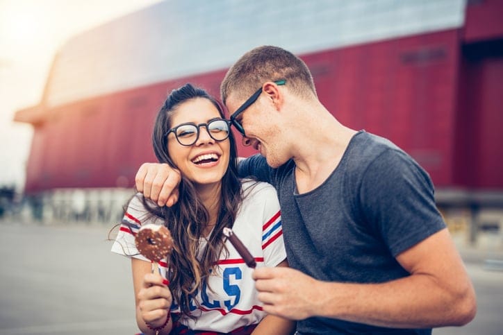 young couple eating icecream