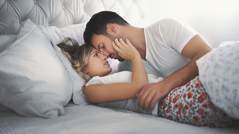 young couple in bed