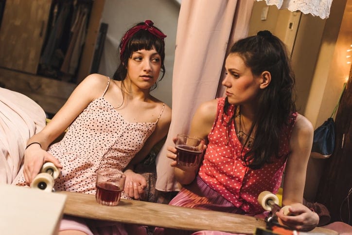 two friends chatting together