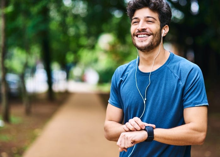 guy out for a run smiling