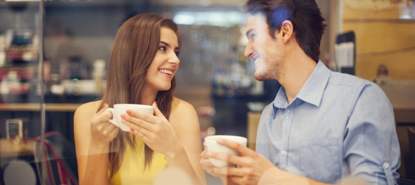 A young couple having coffee in a cafe