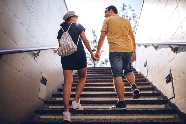 couple leaving subway