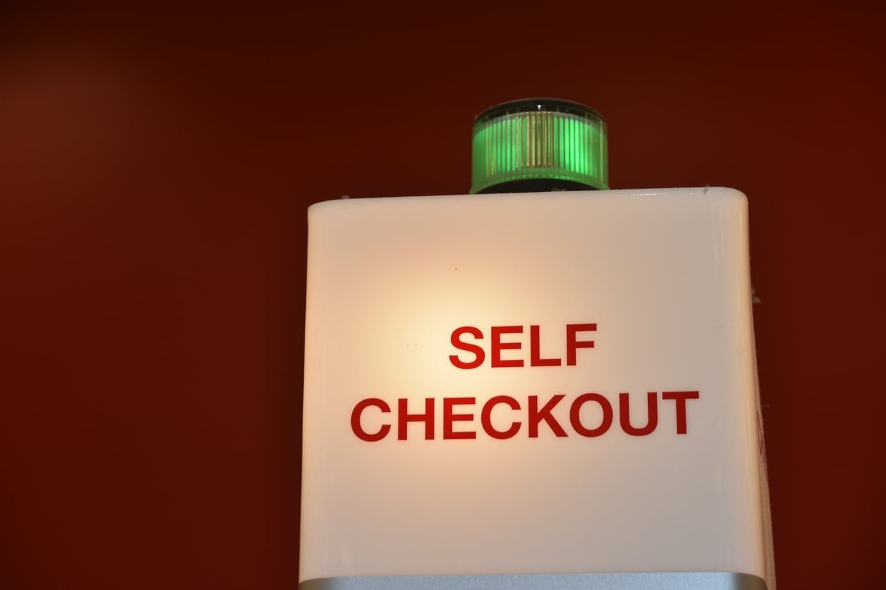 Self check-out sign.