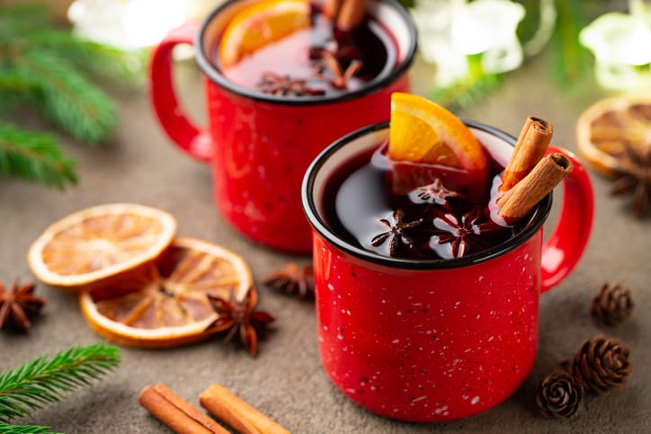 Two cups of mulled wine with spices.