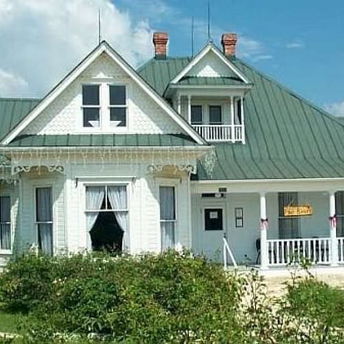 The exterior of a white house.