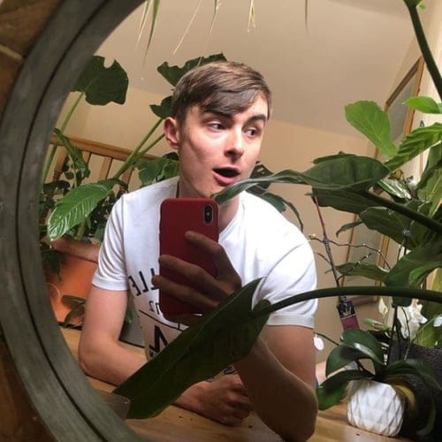 Man with his house plants.