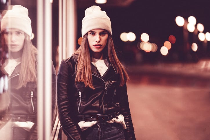 woman staring wearing a beanie hat