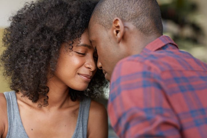 Cropped shot of a young couple sitting in a coffee shop
