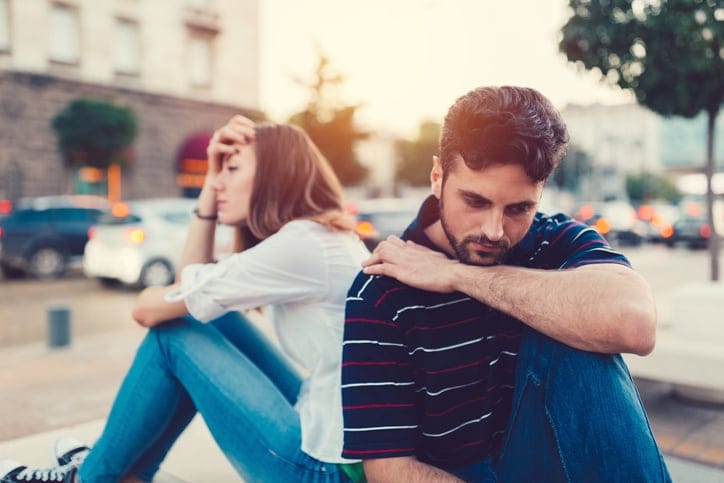 Young woman ignoring her boyfriend