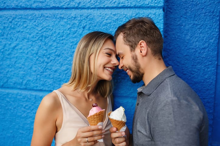 young couple eating icecream