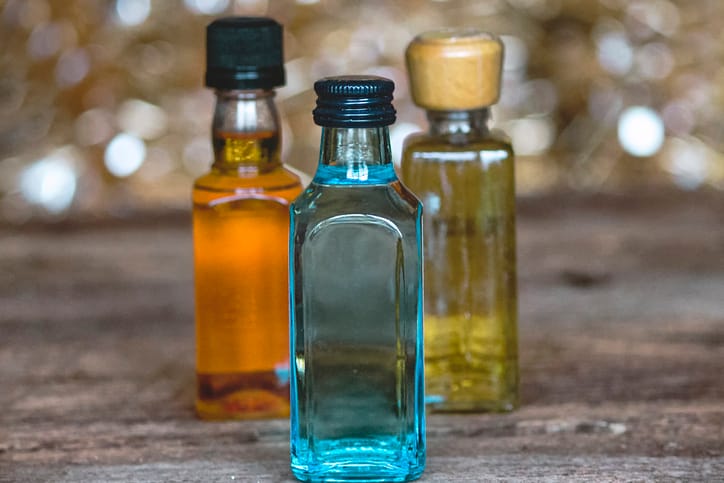 Three Colorful Minibar Bottles of Alcohol.