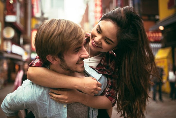 happy couple traveling abroad